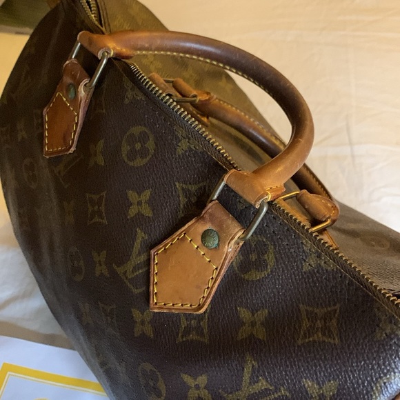 Authenticated Louis Vuitton Monogram Canvas with COA and lock and key #317 - Picture 10 of 16